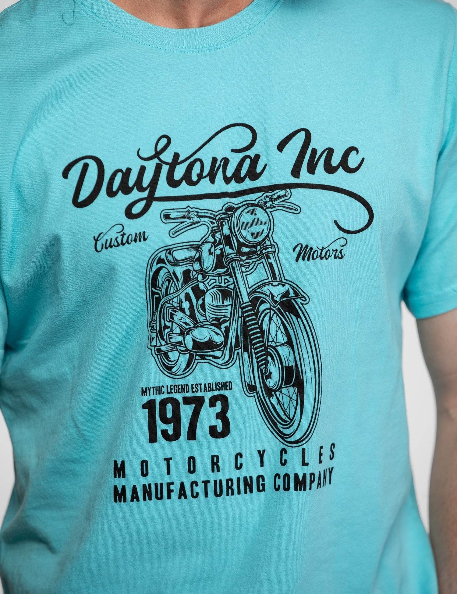 T-shirt turquoise avec logo de moto noir.
