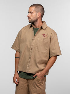 Chemise beige à manches courtes avec logo Daytona brodé.