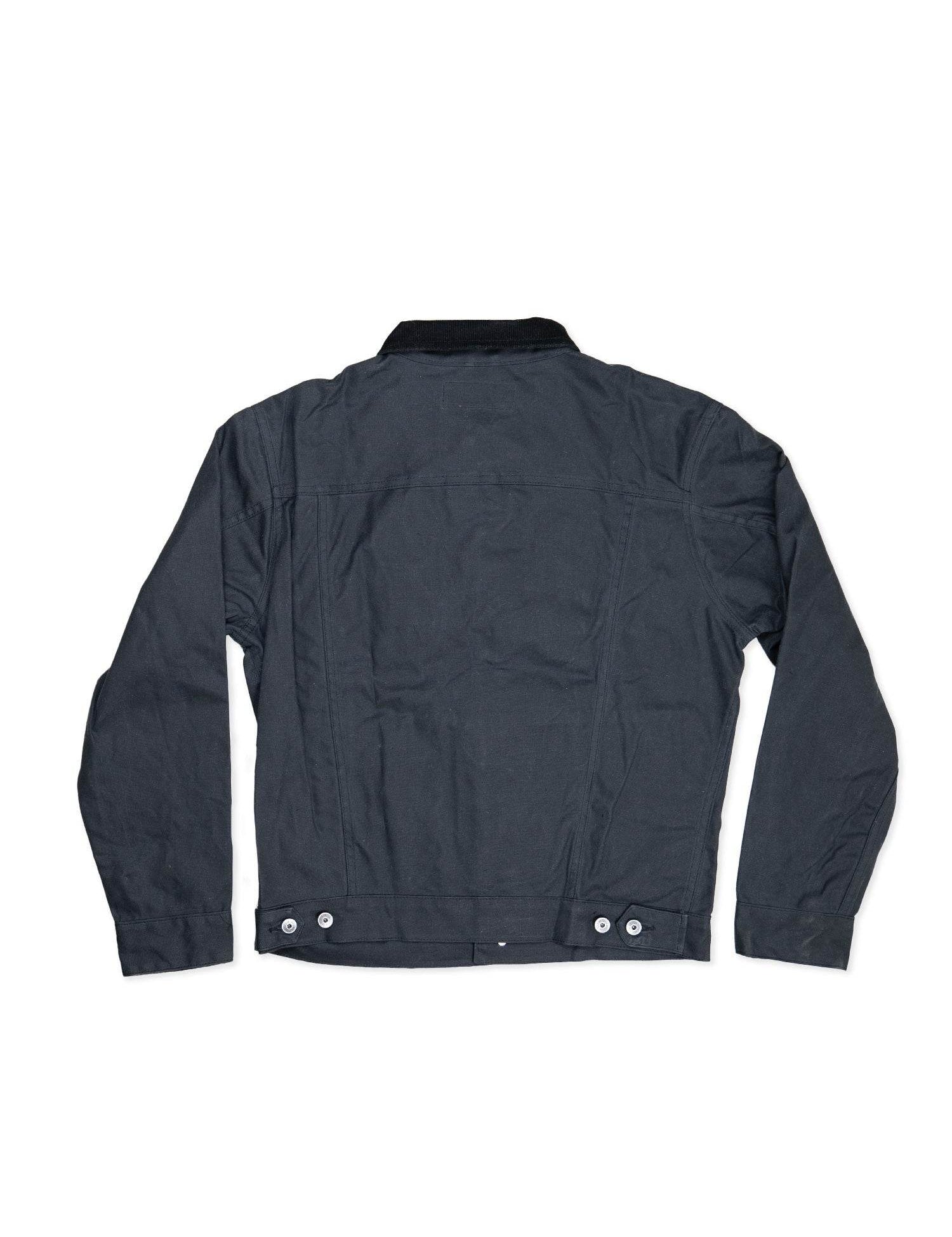 Veste en toile gris anthracite avec col noir et boutons.